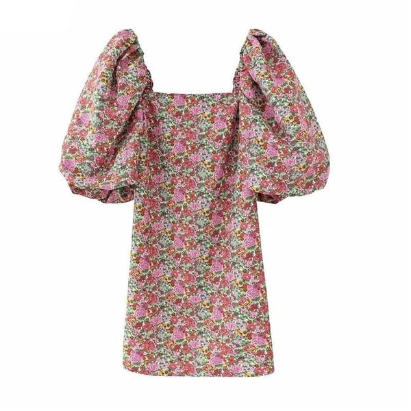 Photo Robe vintage imprimé floral avec manches bouffantes